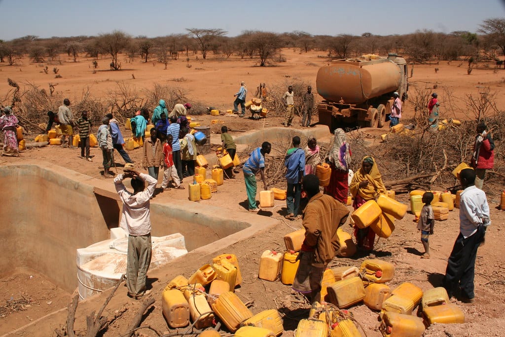 Queing for water from a truck in Ethiopia.