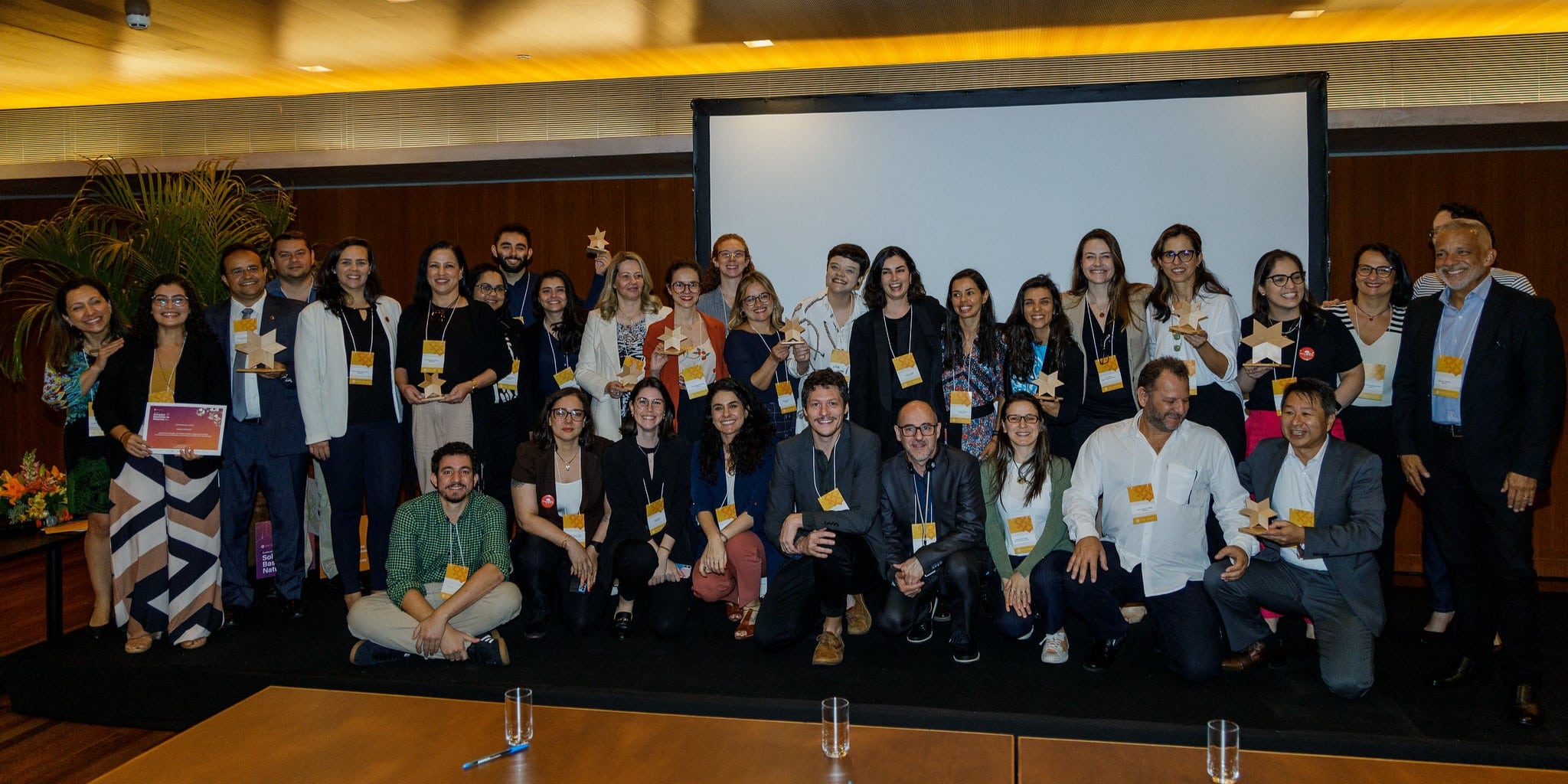 A group photo of project developers and WRI Brasil staff members at the selection event.